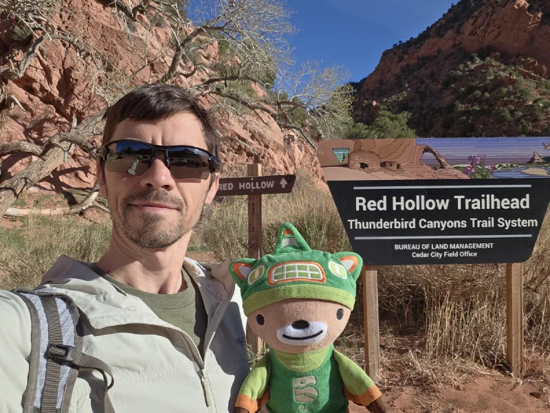 Nicholas holding Sumi at the Red Hollow trailhead