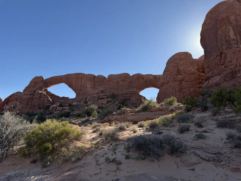 North Window and South Window side by side in a long red sandstone fin, resembling a pair of glasses